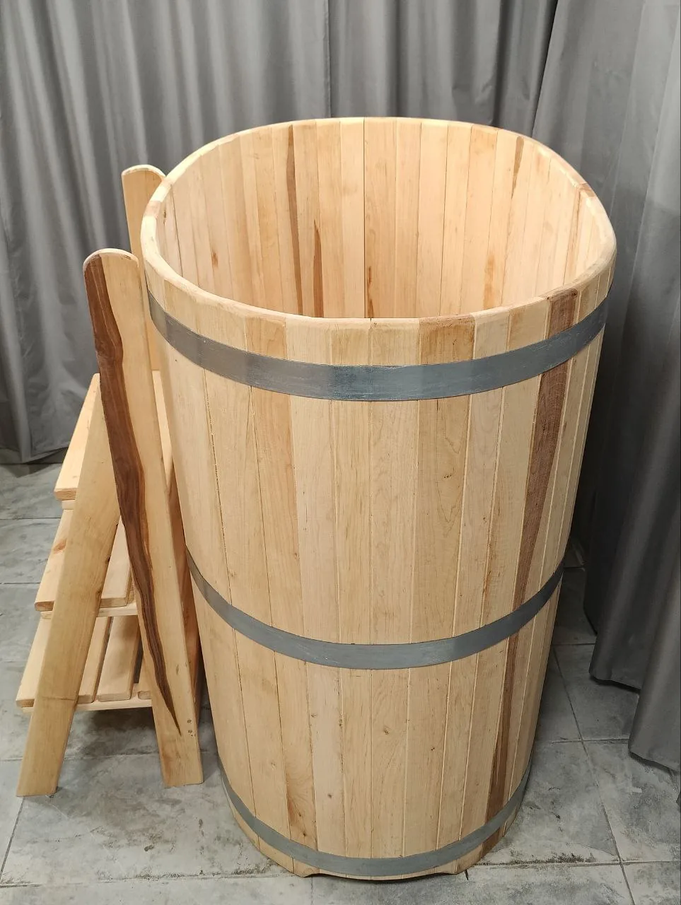 Side view of the CP-1 wooden tub with steps