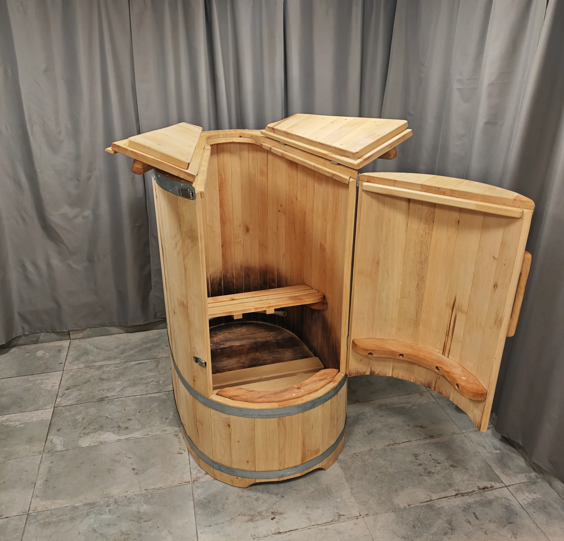 Open Hercoga Norm-2 steam barrel sauna showing the interior